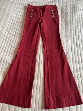 10 Crosby Derek Lam Flared Jeans in Bordeaux with Gold Buttons
